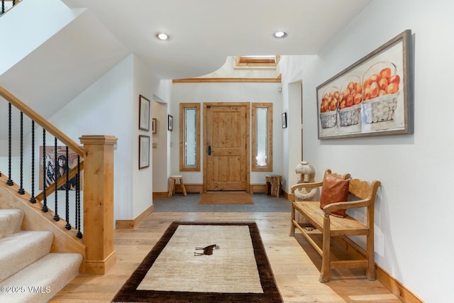 2111 Vermont Rd Unit A, Vail, CO 81657 - foyer entrance featuring wood finished floors, recessed lighting, and stairway