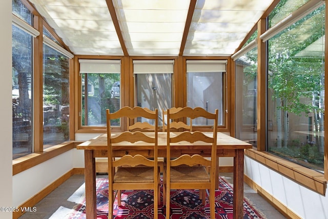2111 Vermont Rd Unit A, Vail, CO 81657 - sunroom featuring baseboards and vaulted ceiling