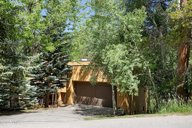 2111 Vermont Rd Unit A, Vail, CO 81657 - exterior space featuring a garage and driveway