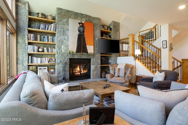 2111 Vermont Rd Unit A, Vail, CO 81657 - living area with wood finished floors, stairs, and a stone fireplace