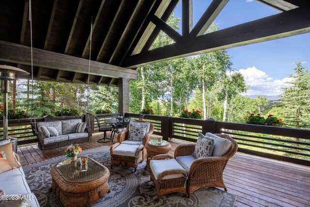 deck featuring an outdoor living space