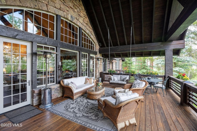 wooden deck with an outdoor hangout area