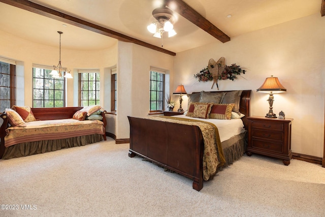 bedroom with beamed ceiling, ceiling fan with notable chandelier, and light carpet