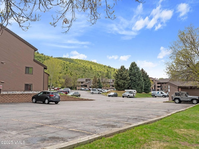 1061 W Beaver Creek Blvd Unit F-203, Avon, CO 81620 - view of concrete road with a mountain view