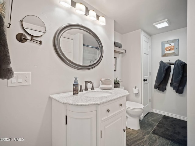 1061 W Beaver Creek Blvd Unit F-203, Avon, CO 81620 - full bathroom featuring vanity, toilet, and baseboards