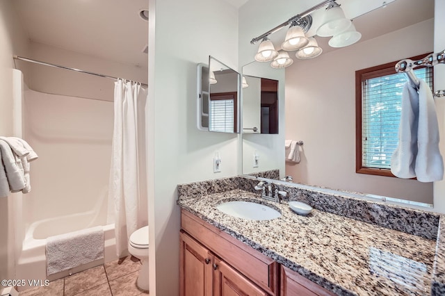 1023 Lions Ridge Loop Unit 111, Vail, CO 81657 - full bath featuring plenty of natural light, toilet, vanity, and shower / bath combo with shower curtain