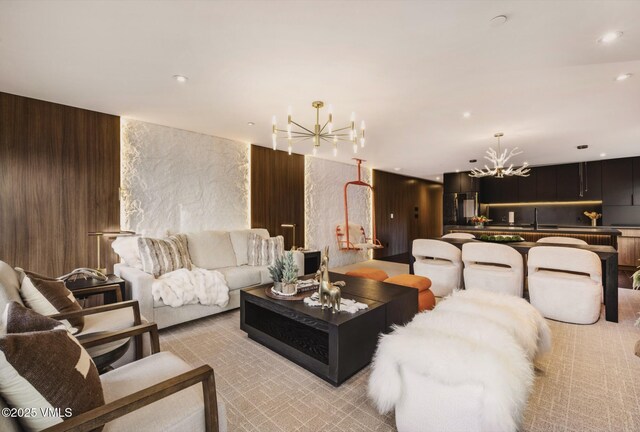 684 W Lionshead Cir Unit 302, Vail, CO 81657 - living room featuring a chandelier, recessed lighting, and light colored carpet