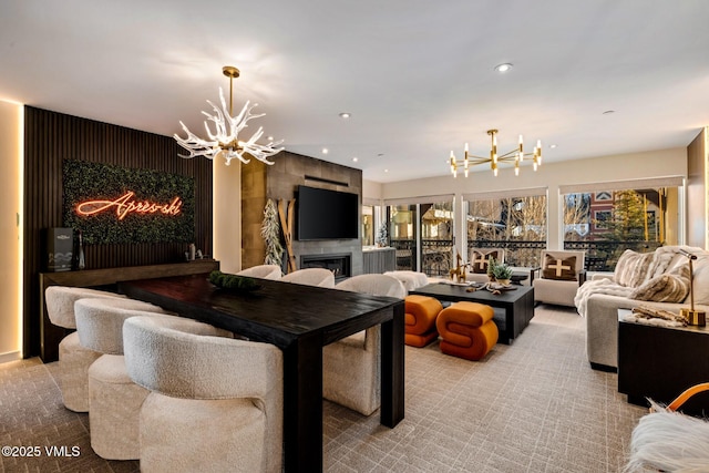684 W Lionshead Cir Unit 302, Vail, CO 81657 - carpeted living area featuring a chandelier, a fireplace, and recessed lighting