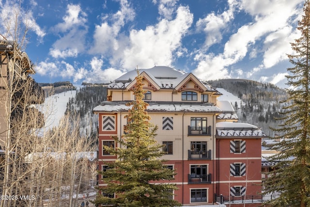 684 W Lionshead Cir Unit 302, Vail, CO 81657 - snow covered building featuring a mountain view