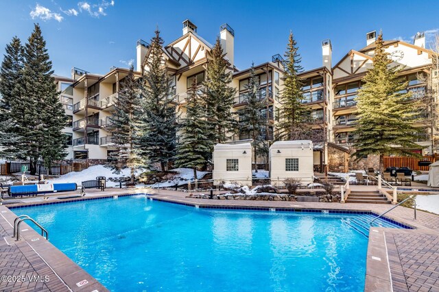 684 W Lionshead Cir Unit 302, Vail, CO 81657 - community pool featuring a patio