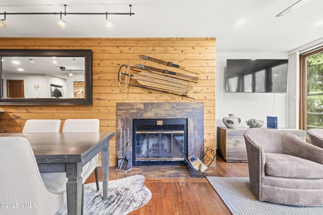 1100 N Frontage Rd W Unit 2504, Vail, CO 81657 - living room featuring wood-type flooring, track lighting, and a fireplace