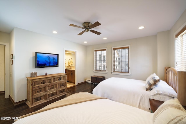 bedroom with a ceiling fan, baseboards, ensuite bath, recessed lighting, and dark wood-type flooring