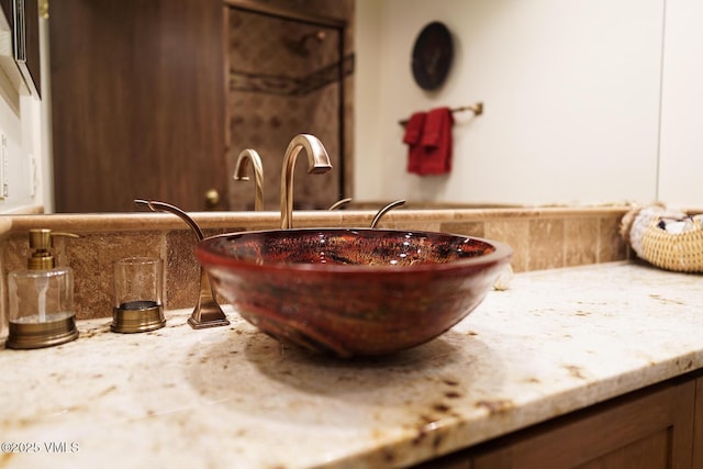 details with a fire pit and vanity