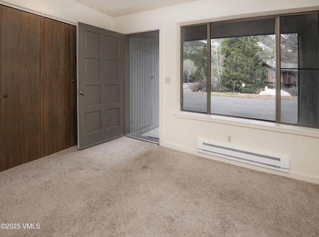 interior space with a baseboard heating unit
