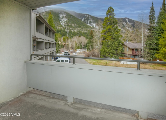 balcony featuring a mountain view