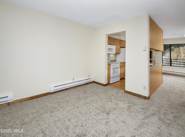 unfurnished living room featuring baseboards, light carpet, and a baseboard radiator