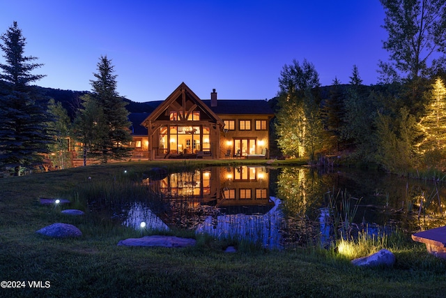 1182 Beard Creek Rd, Edwards, CO 81632 - rear view of property featuring a chimney