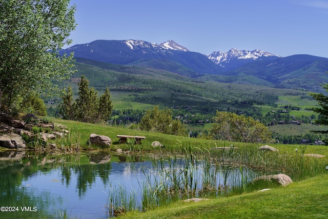 mountain view with a water view