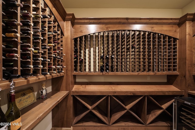 wine cellar featuring wine cooler