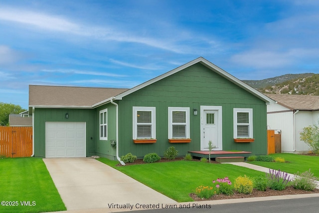 136 Salmon Loop, Gypsum, CO 81637 - view of front facade featuring a garage, driveway, and a mountain view