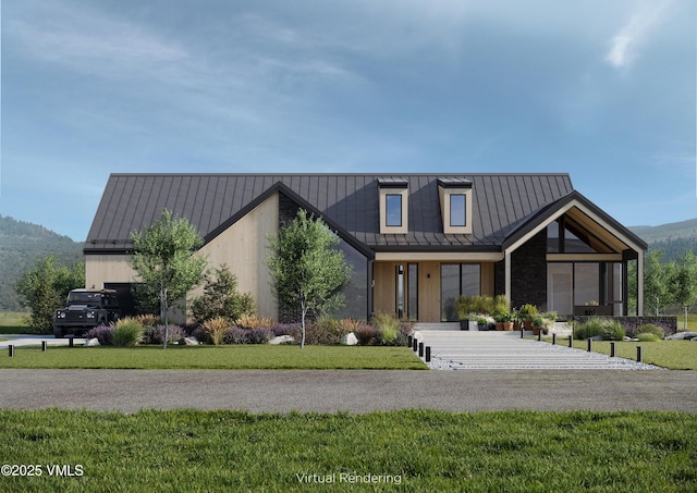 view of front of house featuring a mountain view, a front yard, and covered porch