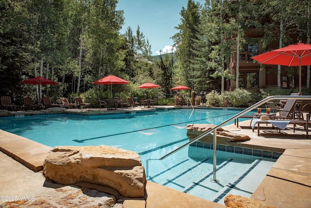 627 Sawatch Dr Unit 105, Edwards, CO 81632 - community pool featuring a patio
