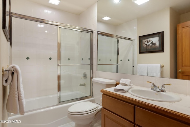 627 Sawatch Dr Unit 105, Edwards, CO 81632 - bathroom featuring vanity and shower / bath combination with glass door