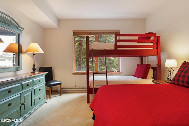 627 Sawatch Dr Unit 105, Edwards, CO 81632 - bedroom featuring a baseboard radiator and light colored carpet