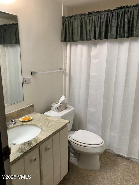 103 Willow Pl Unit 203, Vail, CO 81657 - full bathroom featuring toilet and vanity