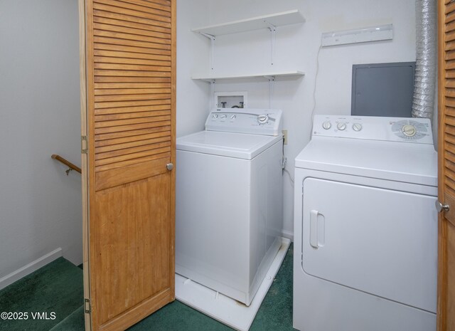 205 Crazy Horse Pt Unit 205, Edwards, CO 81632 - laundry room with washer and clothes dryer and carpet flooring