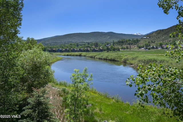 205 Crazy Horse Pt Unit 205, Edwards, CO 81632 - water view with a mountainous background