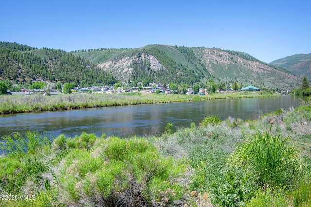 205 Crazy Horse Pt Unit 205, Edwards, CO 81632 - water view featuring a mountainous background