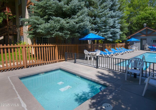 205 Crazy Horse Pt Unit 205, Edwards, CO 81632 - community pool with a patio area