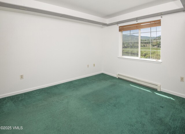 205 Crazy Horse Pt Unit 205, Edwards, CO 81632 - spare room featuring baseboard heating and carpet floors