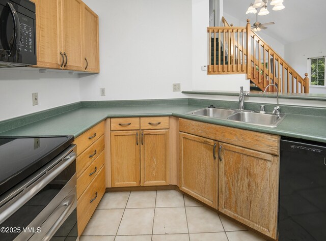 205 Crazy Horse Pt Unit 205, Edwards, CO 81632 - kitchen with black appliances and light tile patterned floors