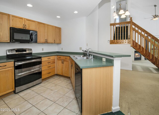 205 Crazy Horse Pt Unit 205, Edwards, CO 81632 - kitchen featuring black appliances, a peninsula, dark countertops, recessed lighting, and ceiling fan
