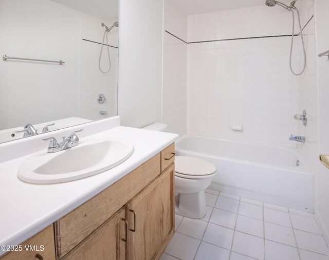 205 Crazy Horse Pt Unit 205, Edwards, CO 81632 - bathroom featuring vanity, bathtub / shower combination, and tile patterned flooring