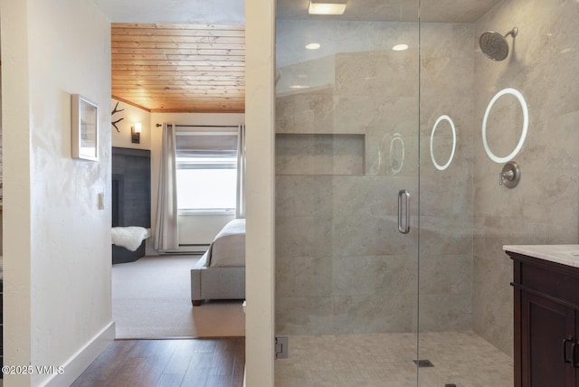 full bath with wood finished floors, connected bathroom, wooden ceiling, a shower stall, and vanity