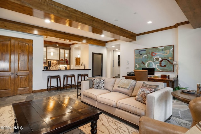 living room with beamed ceiling