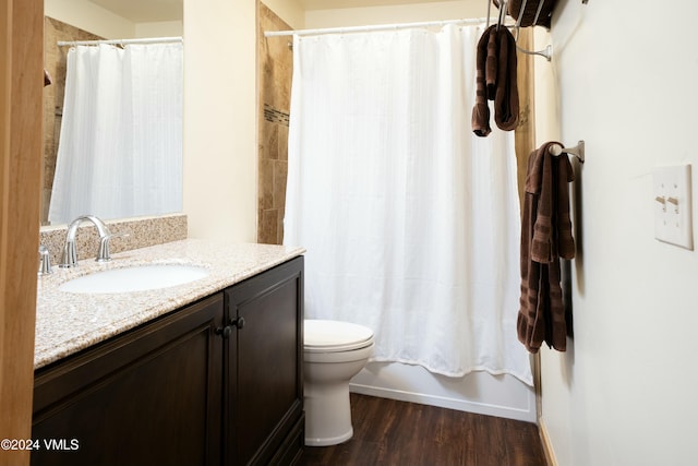 full bathroom with vanity, wood-type flooring, toilet, and shower / bathtub combination with curtain