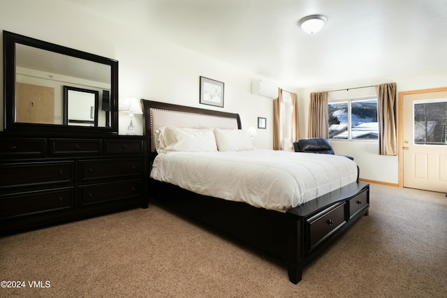 carpeted bedroom featuring an AC wall unit