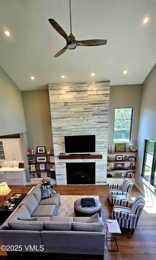 146 Robins Egg Ln, Eagle, CO 81631 - living area featuring ceiling fan, wood finished floors, recessed lighting, and a stone fireplace