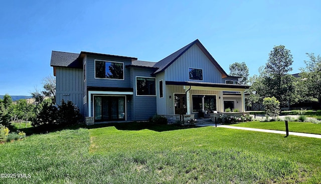 146 Robins Egg Ln, Eagle, CO 81631 - view of front of property with a front lawn, board and batten siding, and a porch
