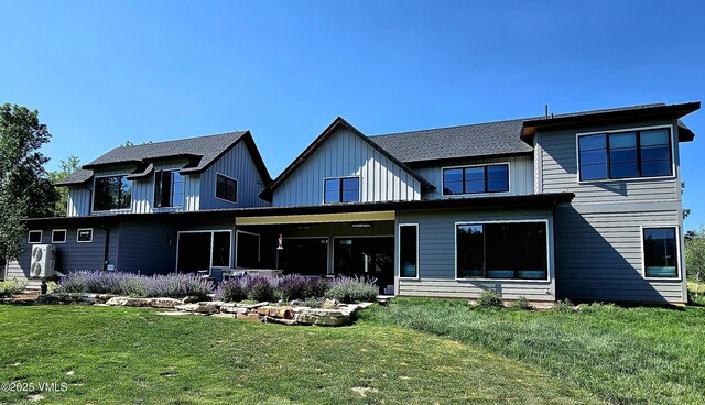 146 Robins Egg Ln, Eagle, CO 81631 - back of property featuring a lawn