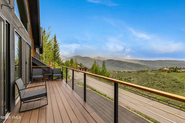5780 Wildridge Rd E Unit A, Avon, CO 81620 - wooden deck with a mountain view