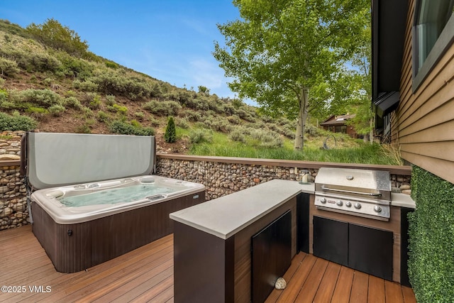5780 Wildridge Rd E Unit A, Avon, CO 81620 - deck with a hot tub