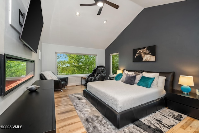 5780 Wildridge Rd E Unit A, Avon, CO 81620 - bedroom with light wood-style floors, high vaulted ceiling, baseboards, a ceiling fan, and recessed lighting