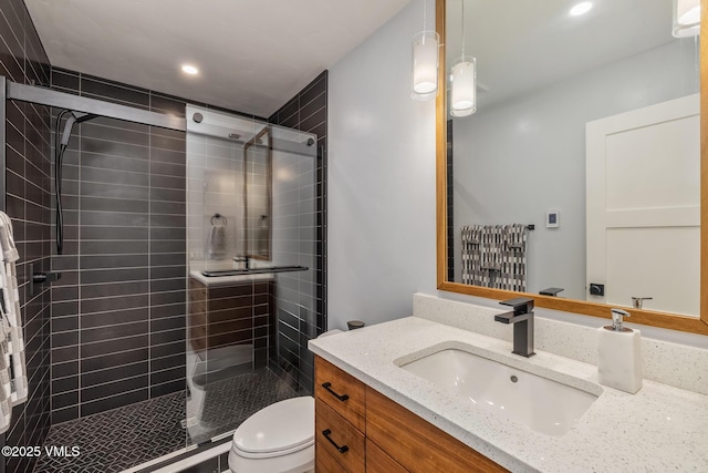 5780 Wildridge Rd E Unit A, Avon, CO 81620 - full bath featuring a shower stall, toilet, vanity, and recessed lighting