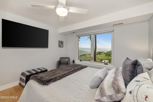 5780 Wildridge Rd E Unit A, Avon, CO 81620 - bedroom with wood finished floors, baseboards, and ceiling fan