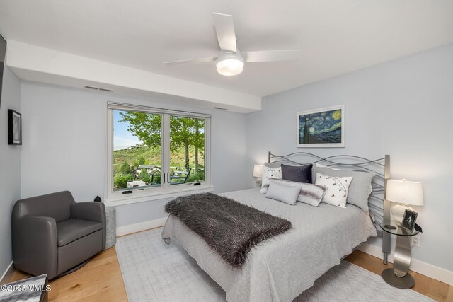 5780 Wildridge Rd E Unit A, Avon, CO 81620 - bedroom with light wood-style floors, baseboards, and a ceiling fan